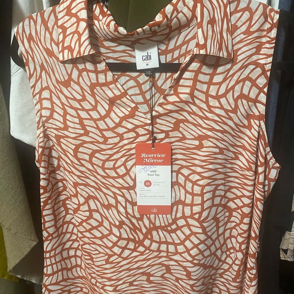 58 NEW Cabi Twirl Top never worn no animals or smoke